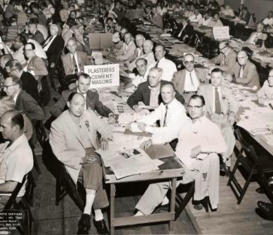 Union members represent Plasterers and Cement Masons at an event.